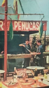 Imagen de un viejo cartel del exterior del restaurante Los Peñucas